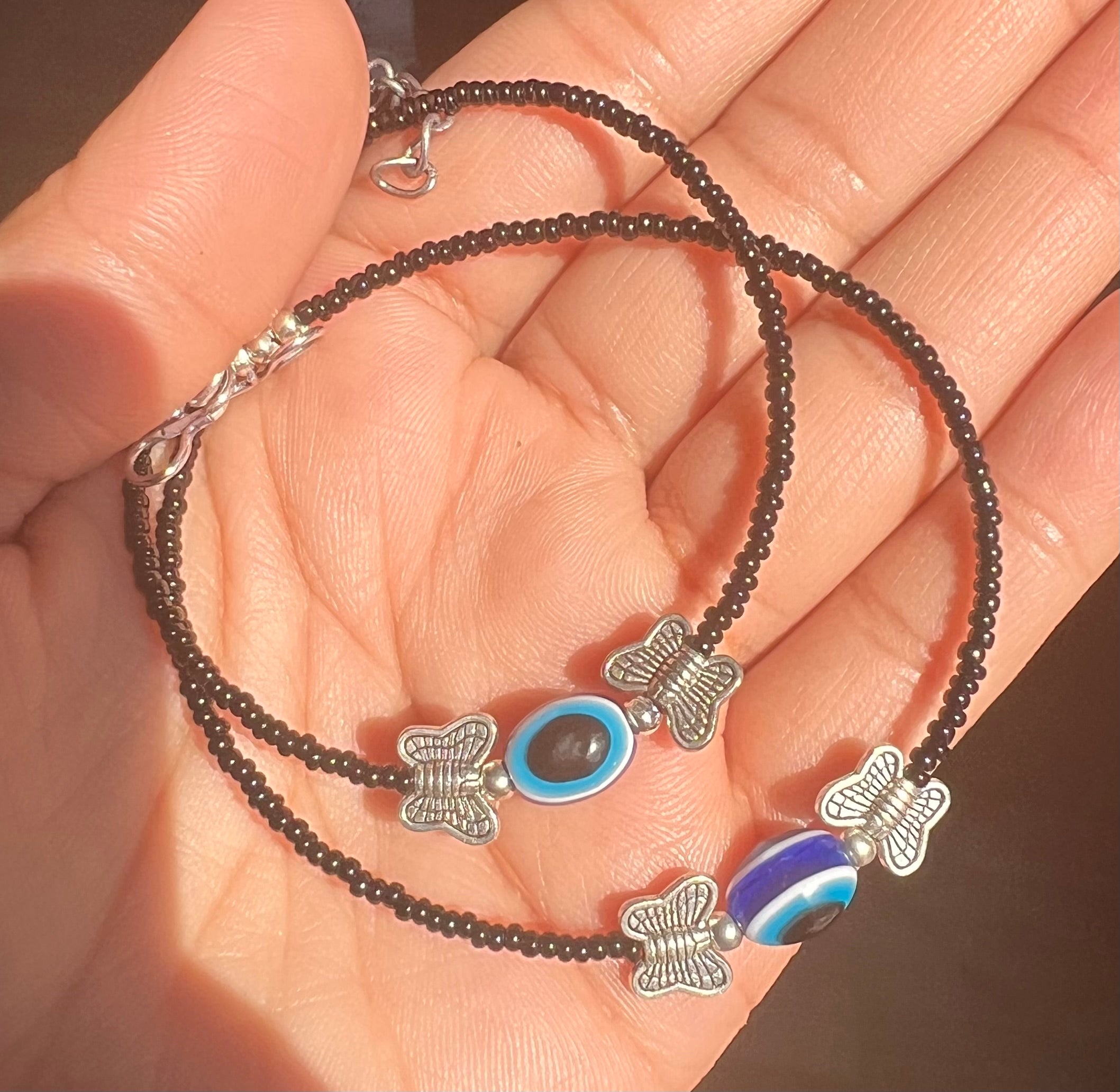 Oxidierte Fußkettchen Payals mit Schmetterling & Evil Eye Design